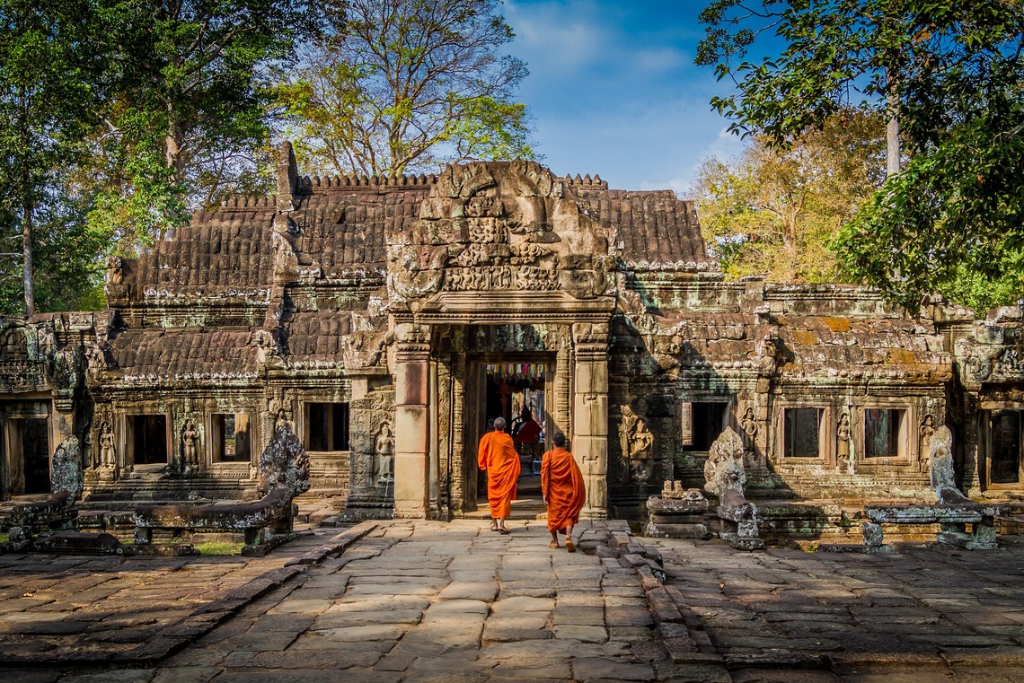 Buddhist Monks in front of Angkor Wat, Cambodia, Asia - Luxury Yacht Charter Destination
