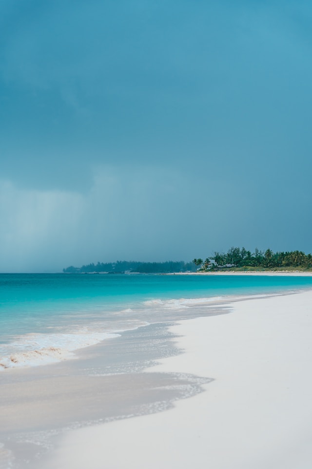 a secluded beach with pristine sand