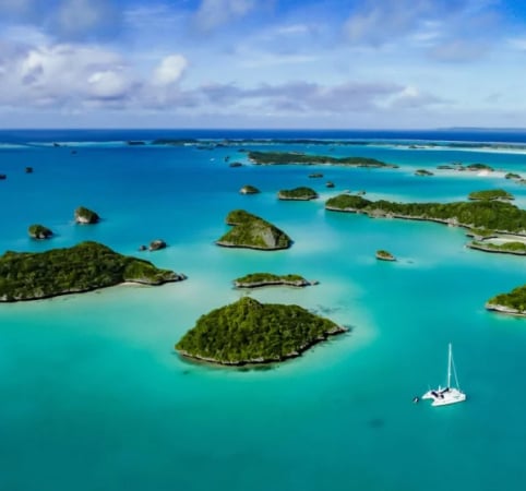 aerial view of several small tropical islands in Asia. You can visit on a luxury yacht charter.